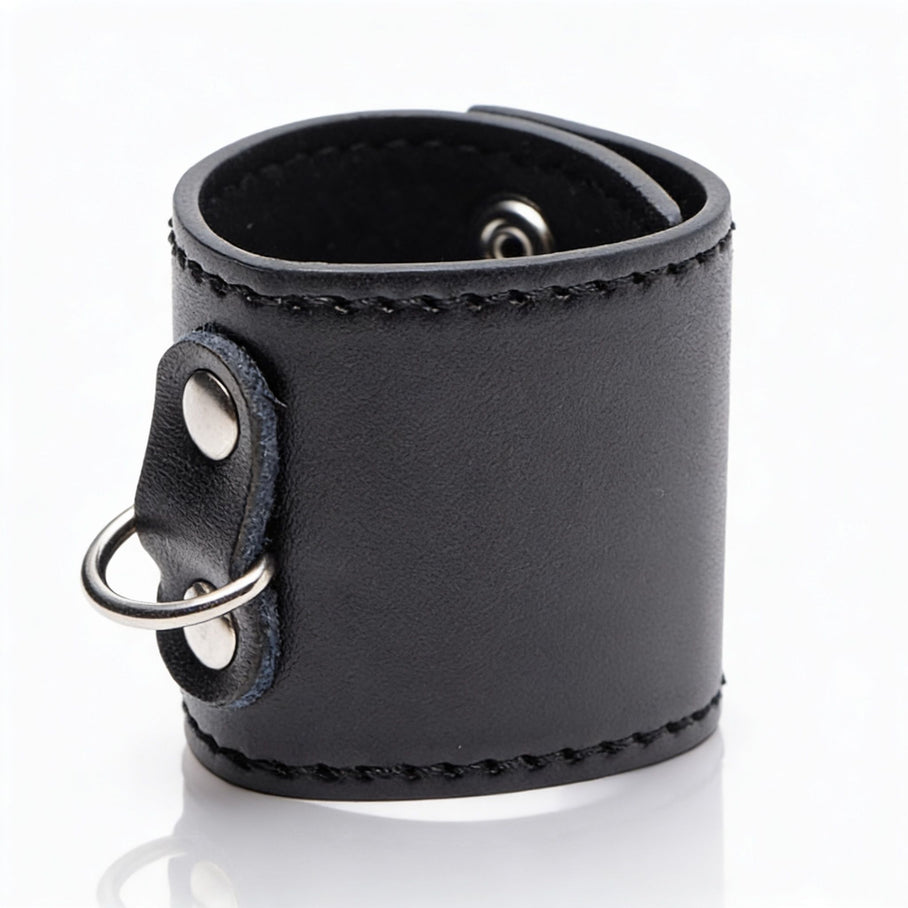 rolled black faux leather ball stretcher with silver d-ring attachment and smooth stitched edges