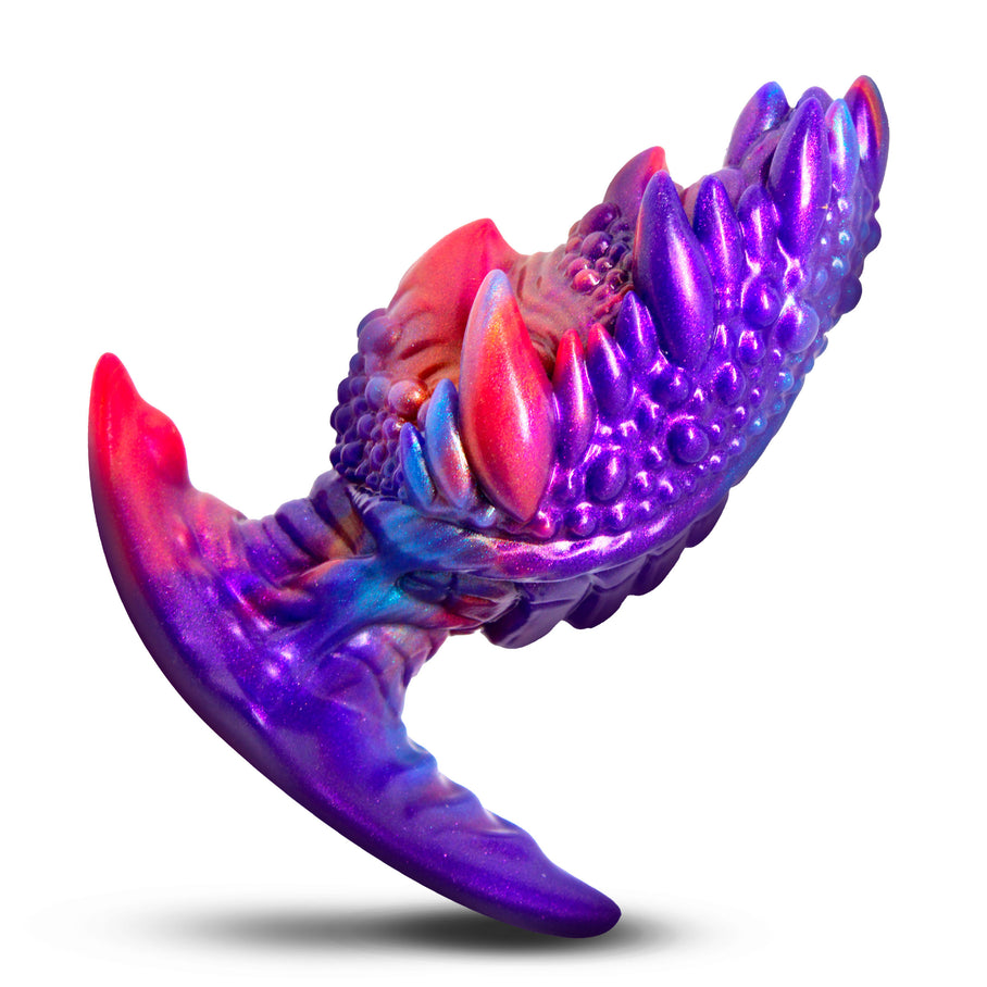 Ergonomic flared base on VOLKRON plug for secure comfortable seated use and extended wear