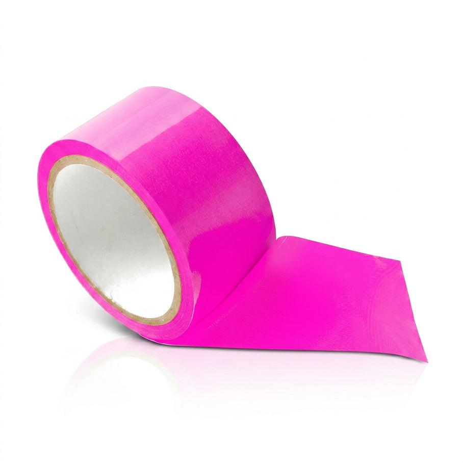 Pink bondage tape roll with a vibrant glossy finish designed for self-adhering restraint and body wrapping without adhesive residue