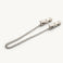 Pair of Naughty Pleasure nipple clamps joined by a chain