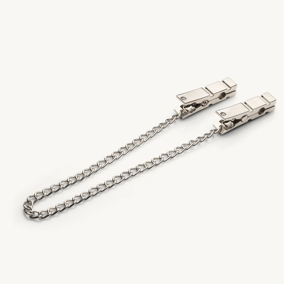 Pair of Naughty Pleasure nipple clamps joined by a chain