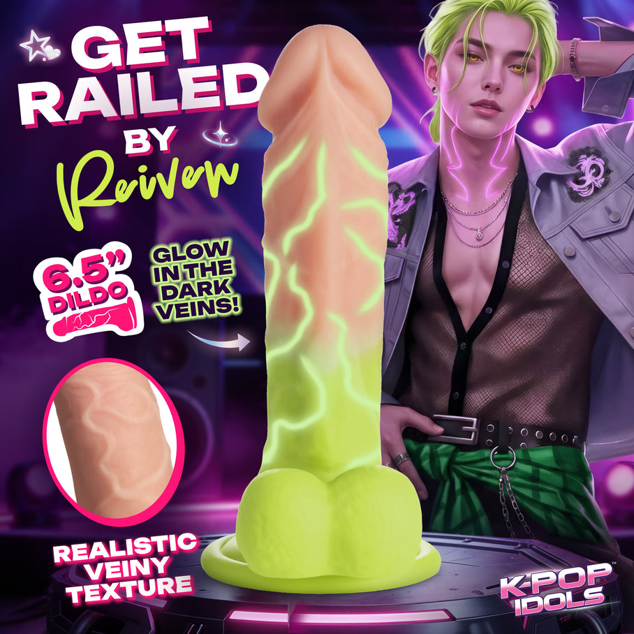 Soft neon-green arc glow on the Reiven silicone dildo