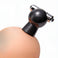 Close-up of a vibrating nipple sucker attached to a breast, highlighting the suction cup design and chrome vibrating stimulation bar