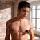 Male model wearing vibrating nipple suckers with chrome-accented stimulation tips designed for hands-free nipple play and sensation enhancement