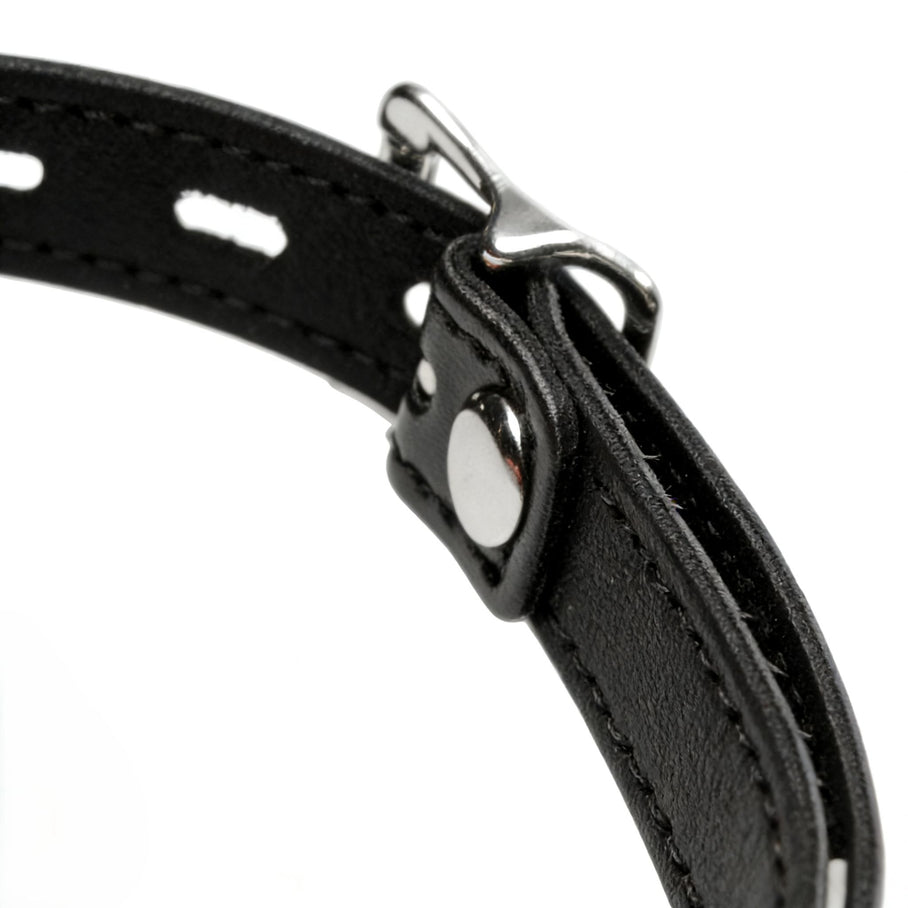 close-up of silver buckle hardware and adjustable black strap on silicone comfort ball gag