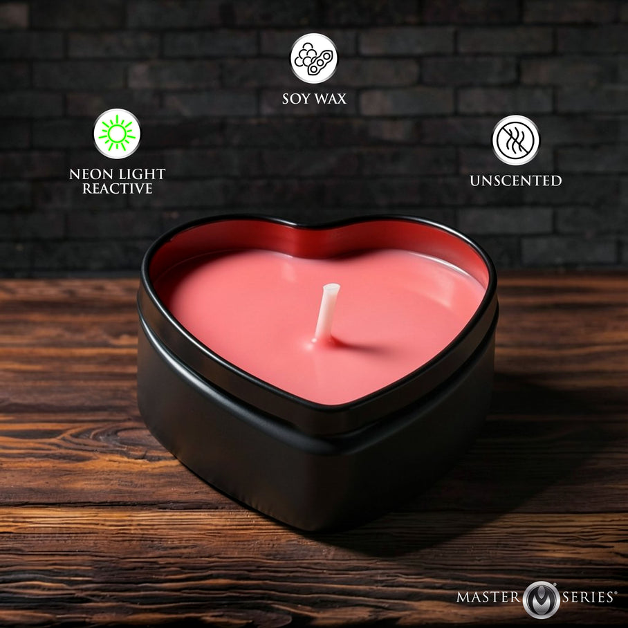 UV reactive heart drip candle lit safely on a nightstand