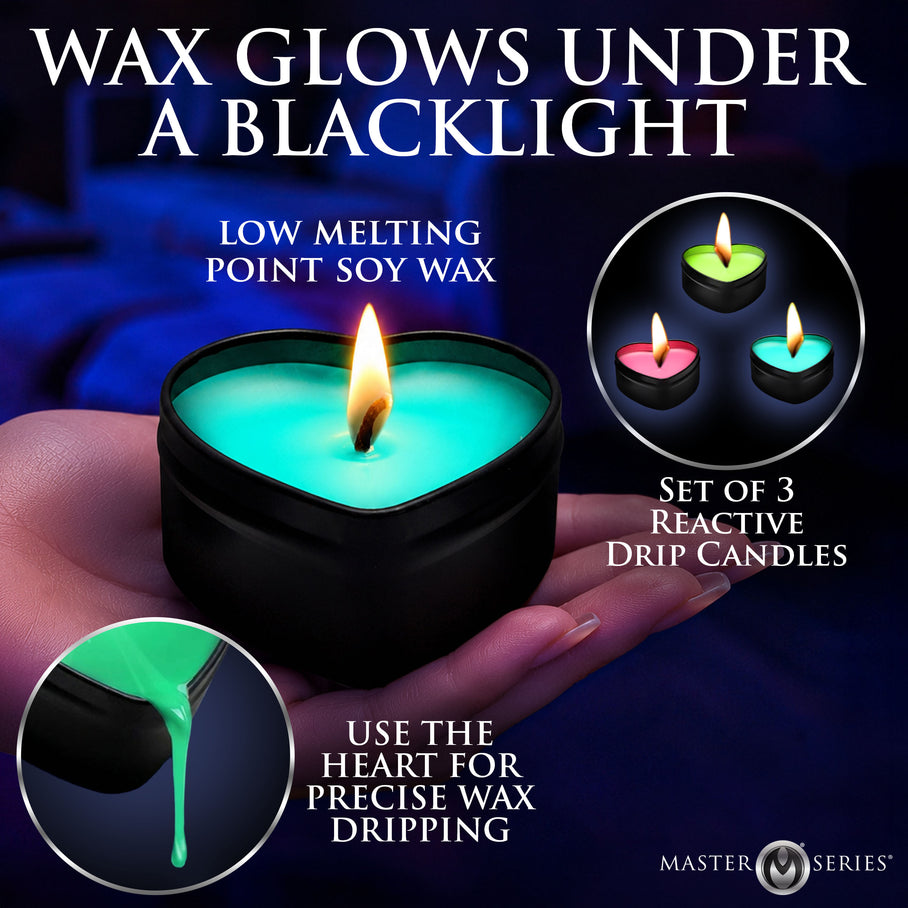 Neon heart candle wax glowing under blacklight during sensation play