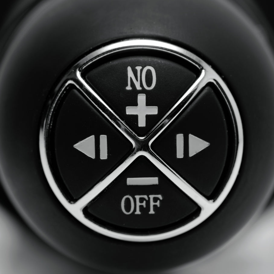 Close-up of The Violator 13-Mode XL Dildo Thruster control panel with buttons for power, intensity adjustment, and mode selection